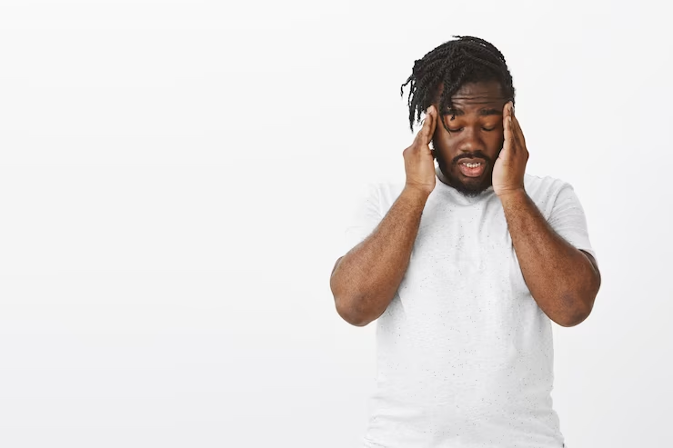 A black man irritated with noises - Top 10 Signs You Are Spiritually Gifted